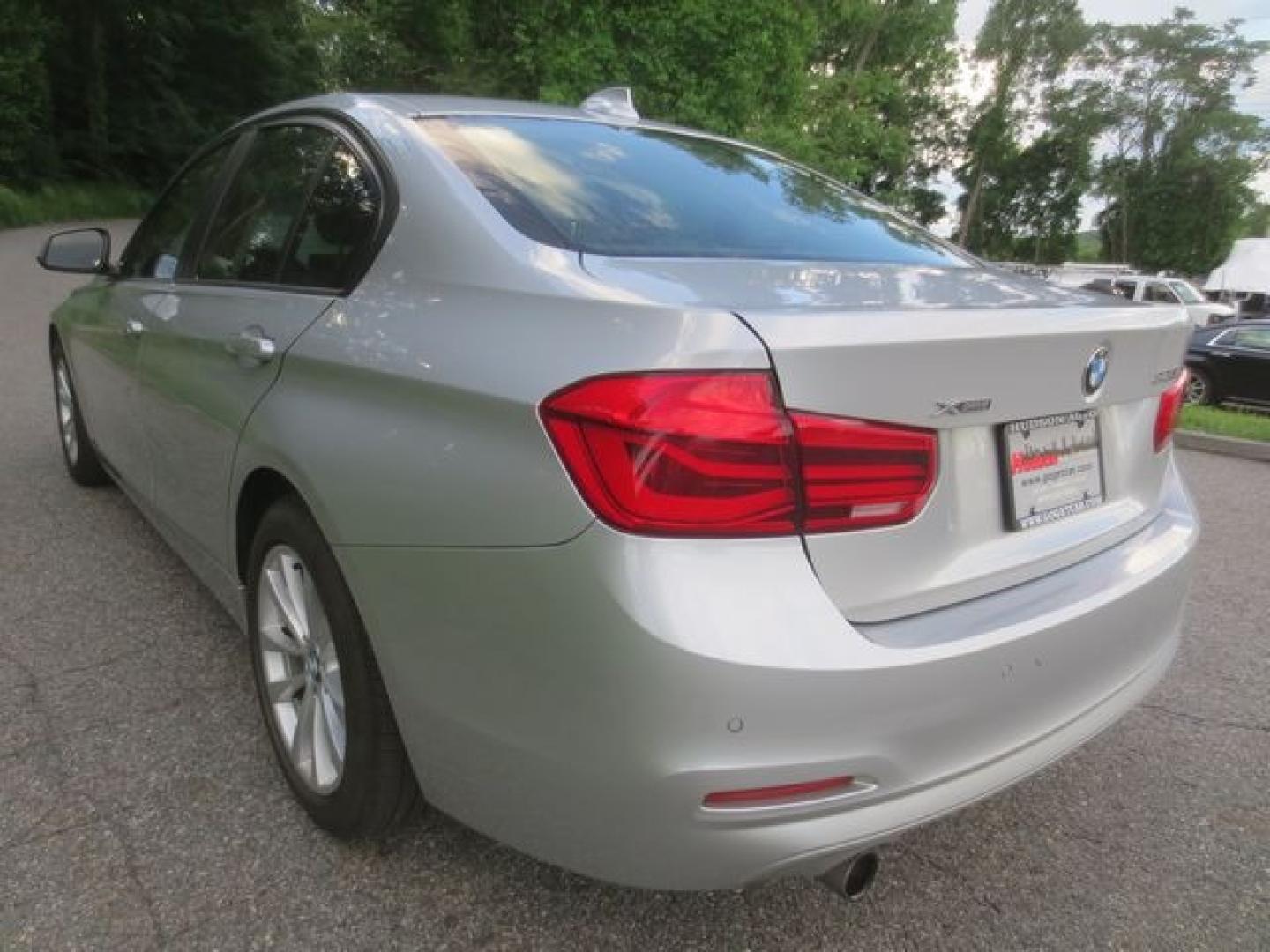 2016 Blue /Black BMW 3-Series (WBA8E5G59GN) with an 2.0l 4cyl Turbo engine, Automatic transmission, located at 270 US Route 6, Mahopac, NY, 10541, (845) 621-0895, 41.349022, -73.755280 - Photo#4